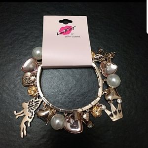 Betsey Johnson Rose Gold tone charm bracelet